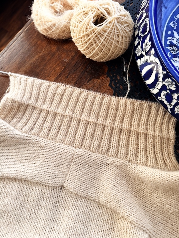 Ribbed neckband in progress on Paul Cardigan by MorecaKnit